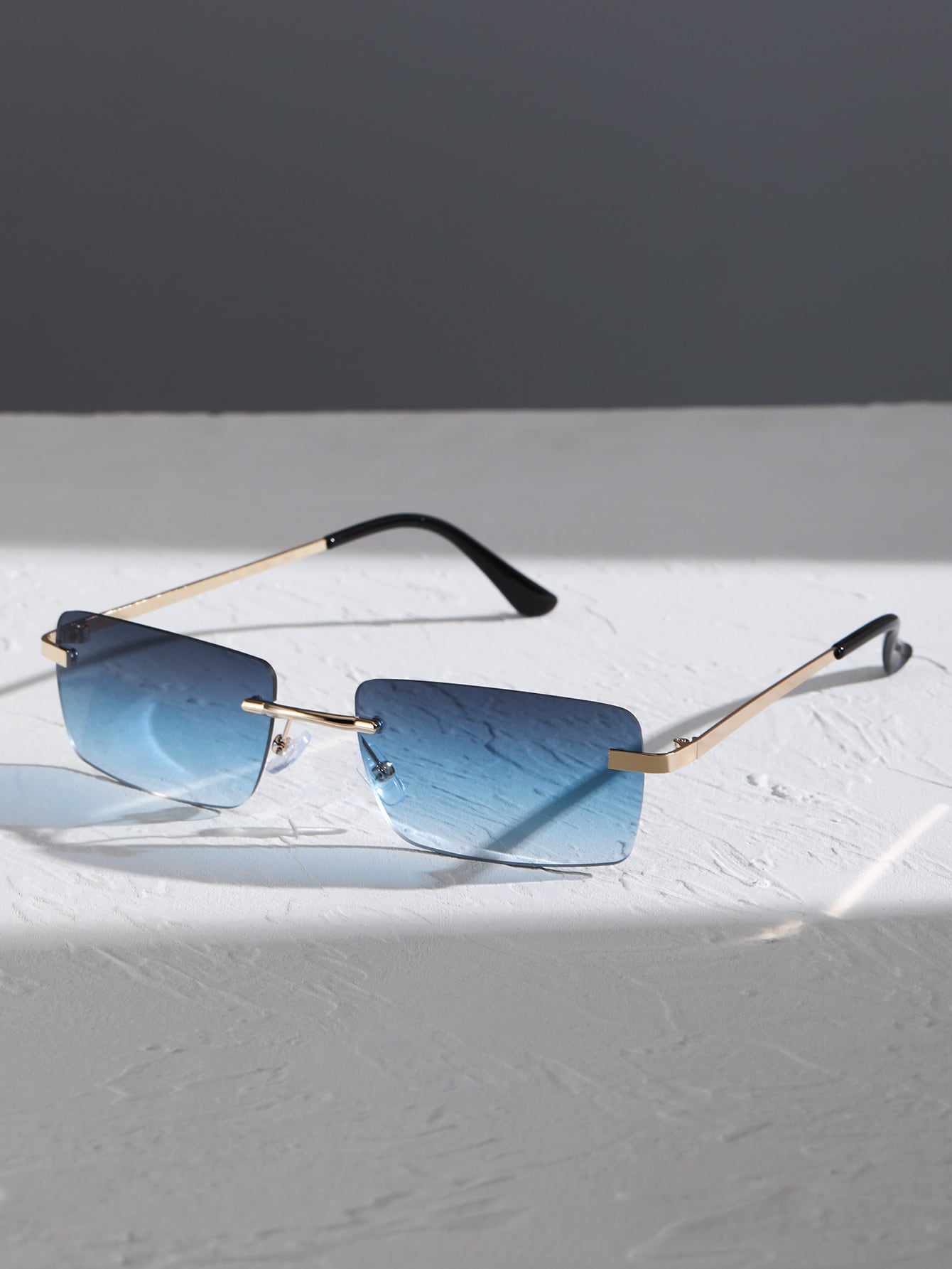 JP’s Two-Tone Metal Rimless Glasses
