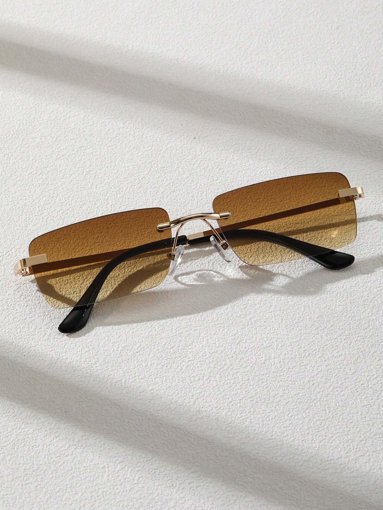 JP’s Two-Tone Metal Rimless Glasses